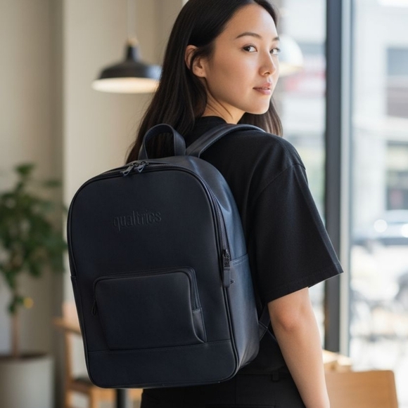 Qualtrics Black Waterproof Laptop Travel Backpack Front Pocket Adjustable Straps - Picture 1 of 10